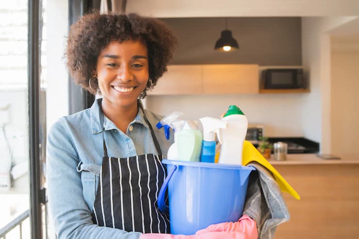 Girl holding the detergents